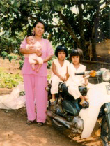 Kiki with her family in Vietnam