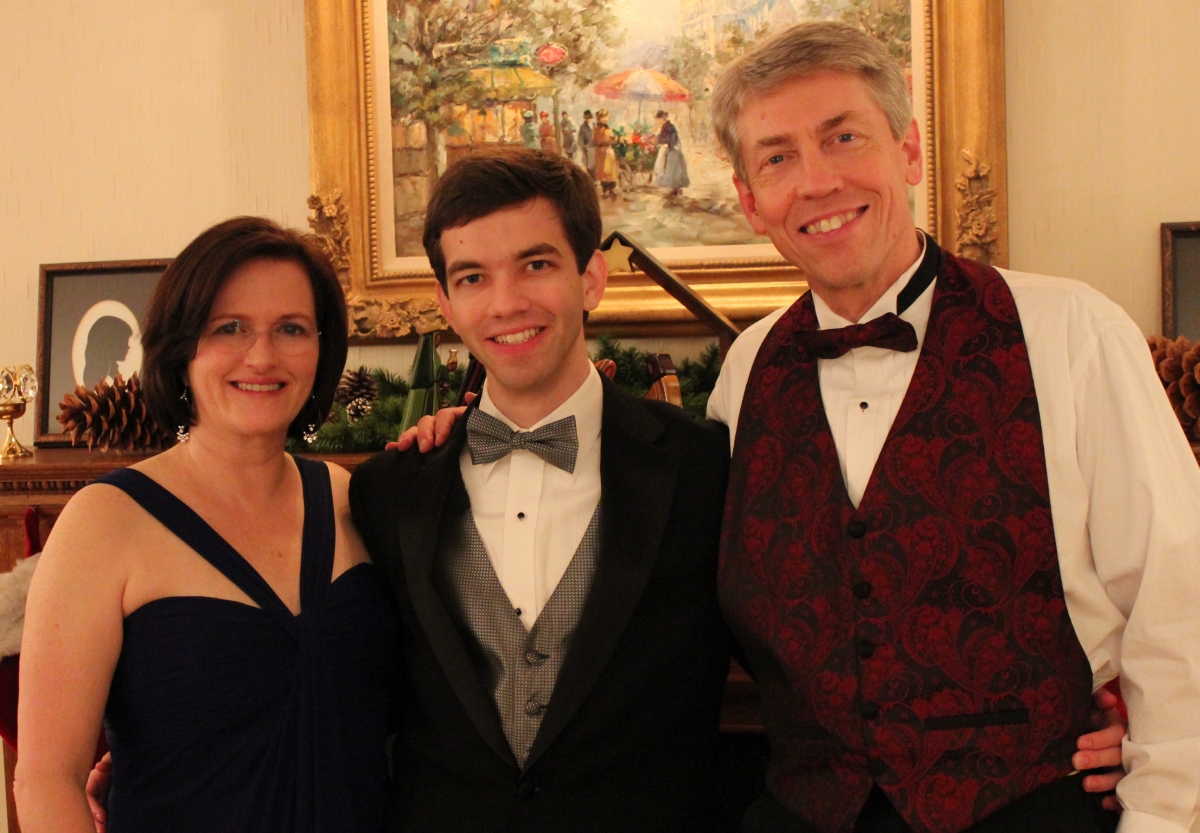 Matthew and his parents at 2011 Christmas party