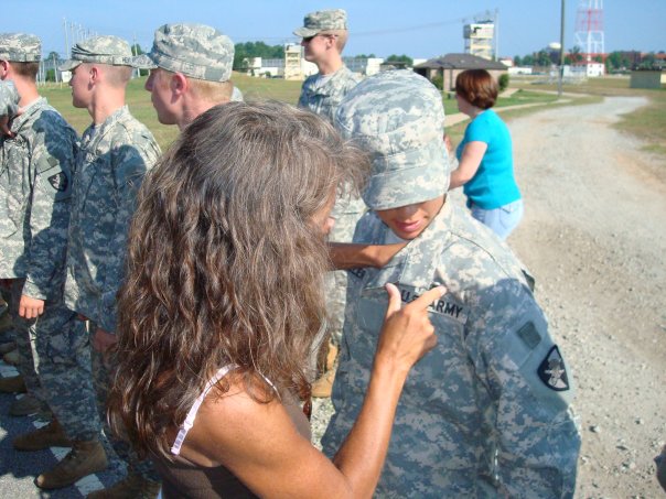 Katie Miller having her Army uniform inspected