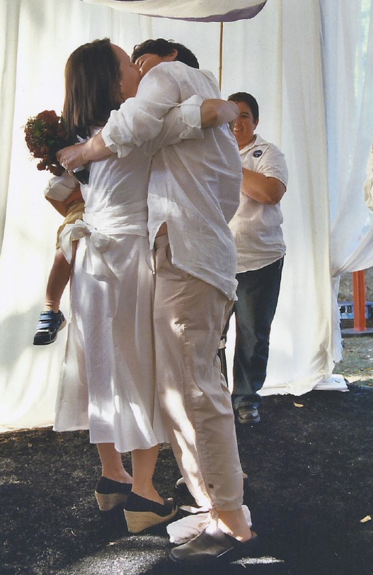 Rachel and Felicia kiss at their wedding