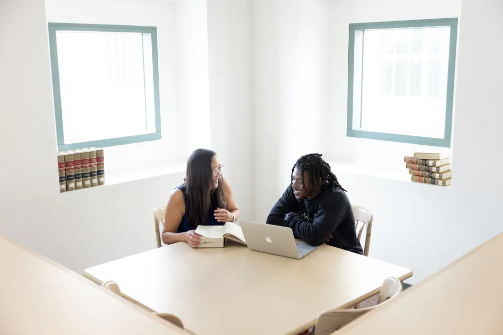 Student and Teacher at table