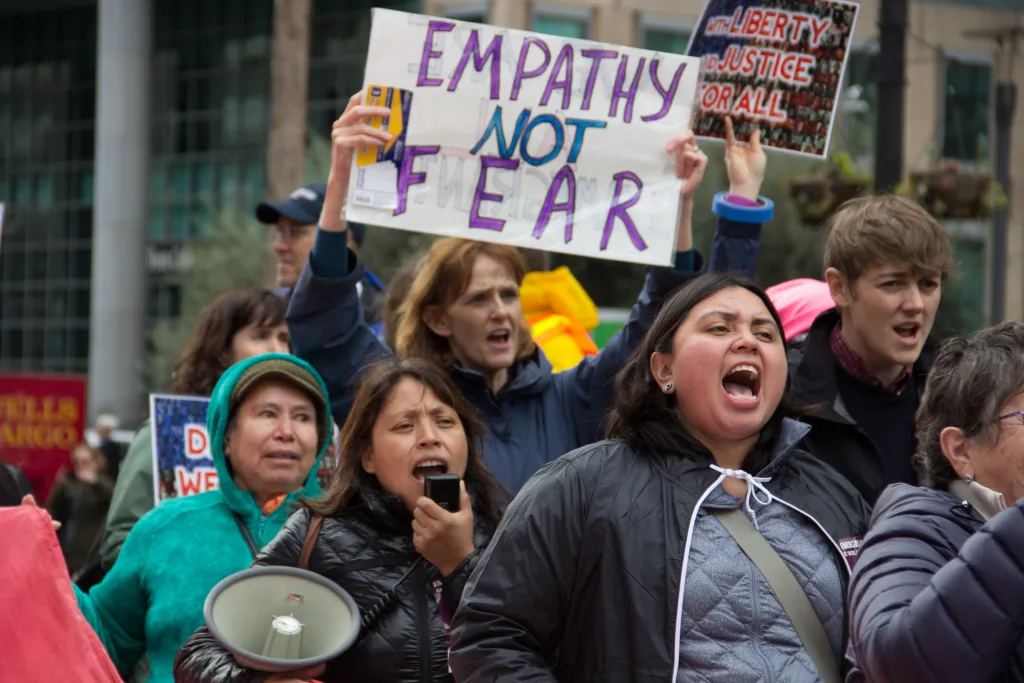 People holding signs at a protest