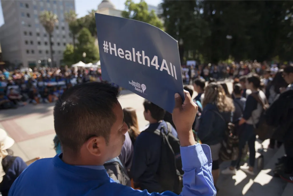Closeup of a demonstrator during a Health4All rally