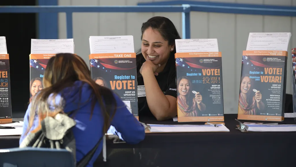 Photo of someone registering to vote