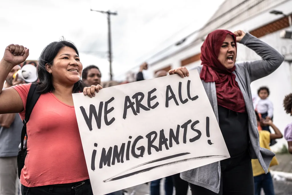 Demonstrators rallying in support of immigrants