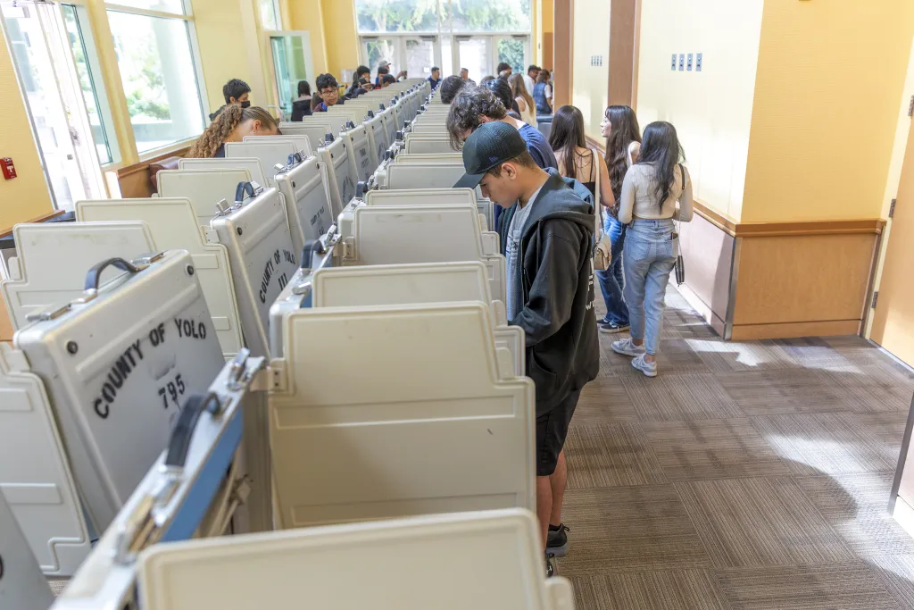Voters in polling place in Yolo County