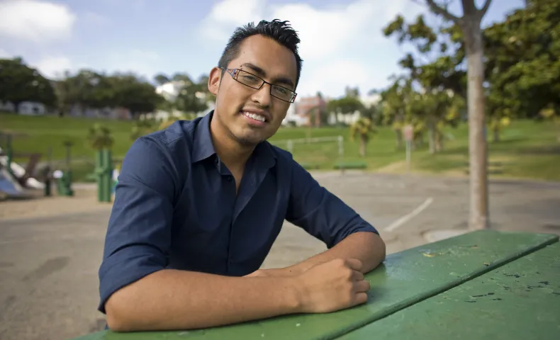 Angel talking about being undocumented and gay, in Dolores Park