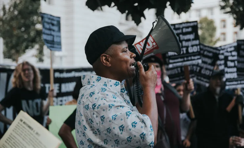 Man with megaphone at rally