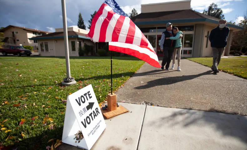 Sign pointing towards polling place