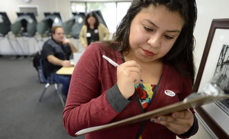 Woman registering people to vote