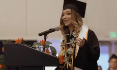 Woman speaking to crowd