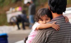 Girl hugging father