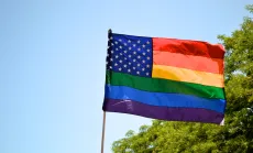 Gay pride and American flag symbolizes LGBT and immigrant rights