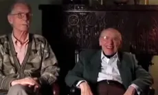 Screencap of Richard and John sitting together