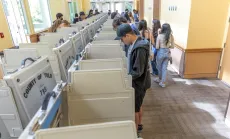 Voters in polling place in Yolo County