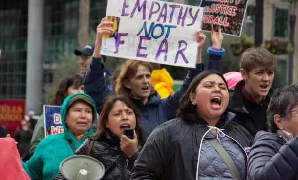 People holding signs at a protest