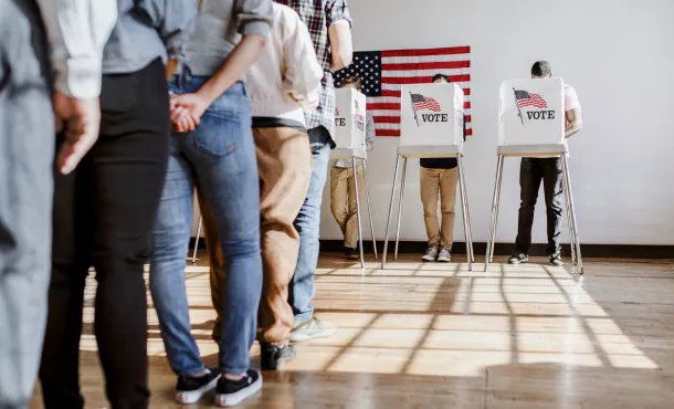 Voters waiting in line to fill out their ballots