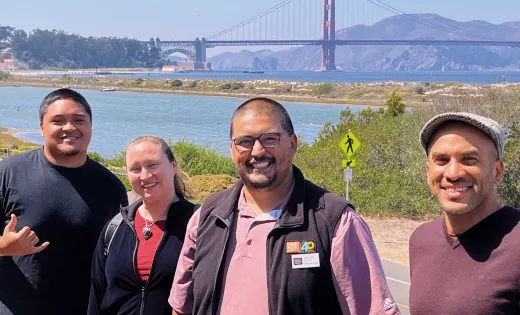 Haas Jr. Vice President of Programs, Robert Joseph, and Program Associate, Lisa Marquez-Valenti with Ernesto Pepito and Dylan Nepomuceno of the Crissy Field Center 
