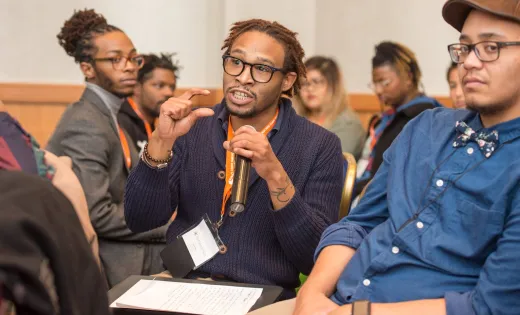 Youth leader leading a group discussion