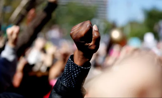 Fist in the air at a rally