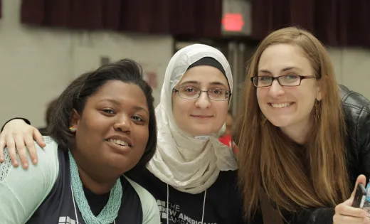 Group photo of three New Americans Campaign volunteers