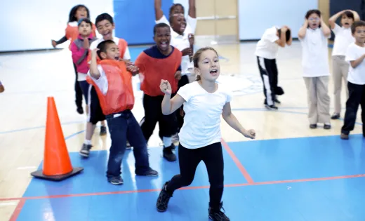 Children playing sports in the gym