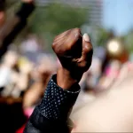 Fist in the air at a rally