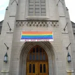 Church with "All Are Welcome" sign