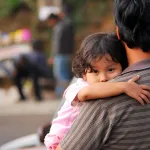 Girl hugging father