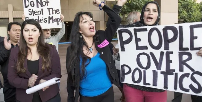 Local organizers demonstrating for fair political redistricting decisions.