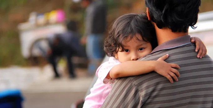 Girl hugging father